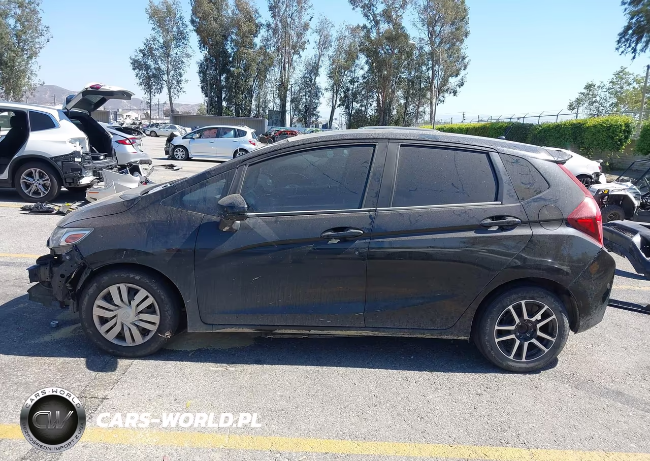 2015 Honda Fit Lx VIN:3HGGK5H52FM750061 - 15