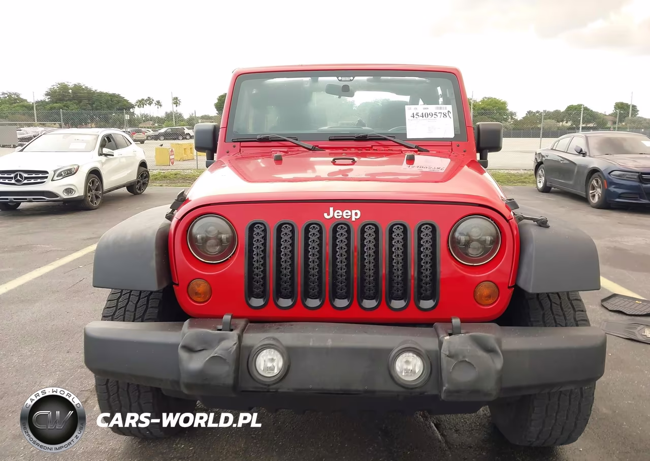 2011 Jeep Wrangler Sport VIN:1J4AA2D12BL523192 - 12