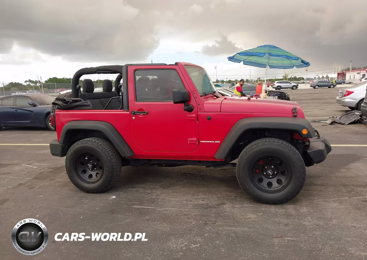 2011 Jeep Wrangler Sport VIN:1J4AA2D12BL523192 - 13