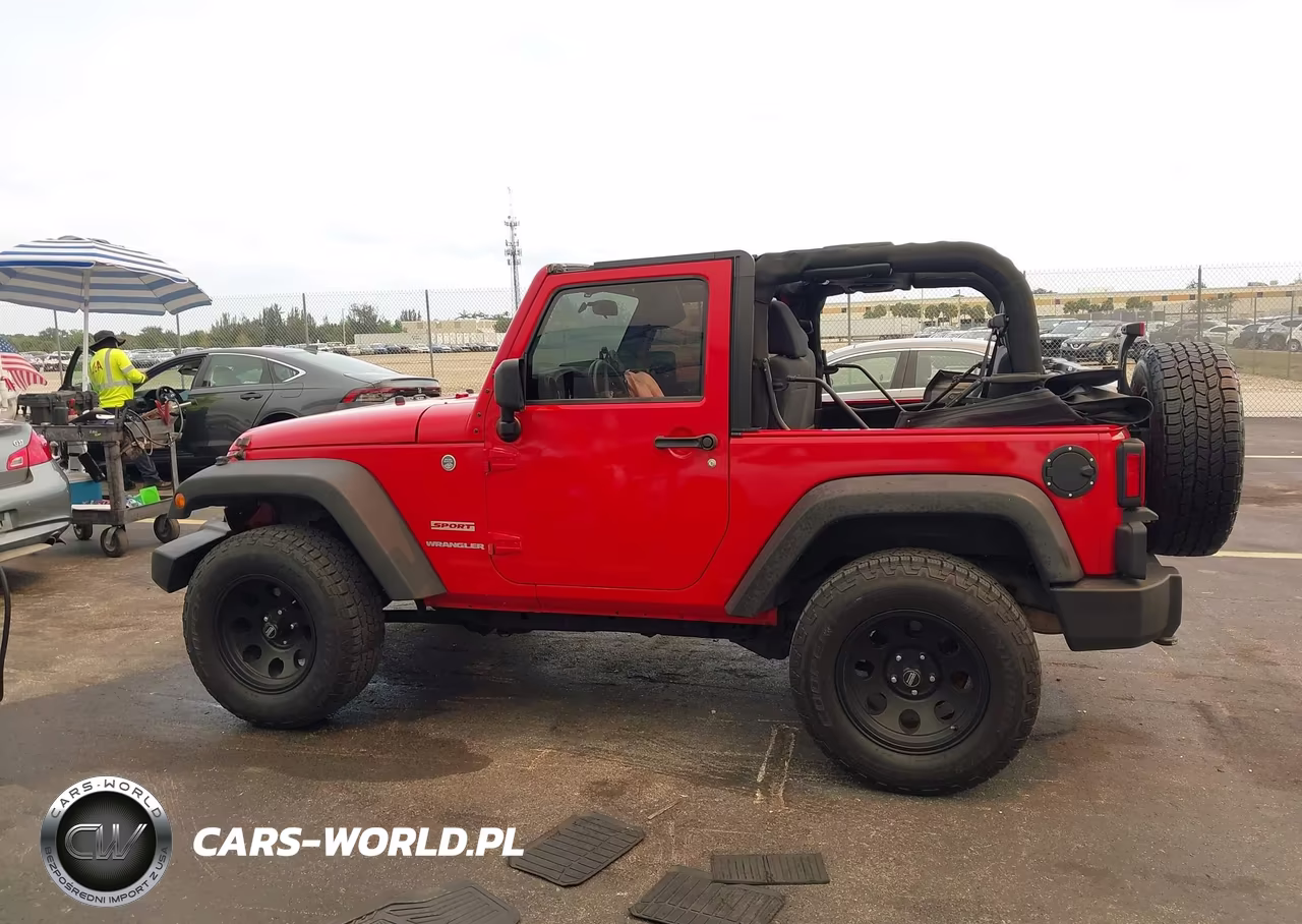 2011 Jeep Wrangler Sport VIN:1J4AA2D12BL523192 - 14