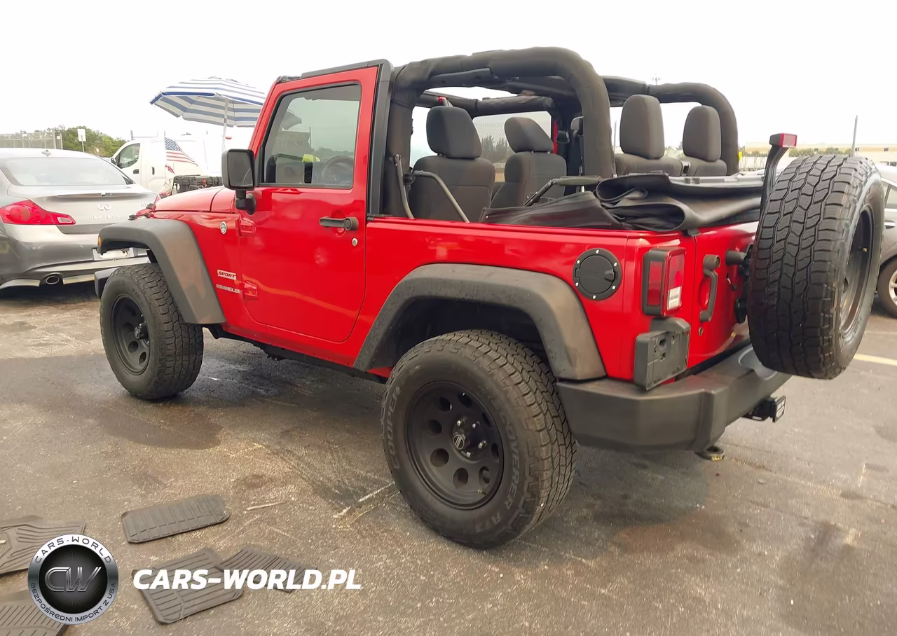 2011 Jeep Wrangler Sport VIN:1J4AA2D12BL523192 - 3