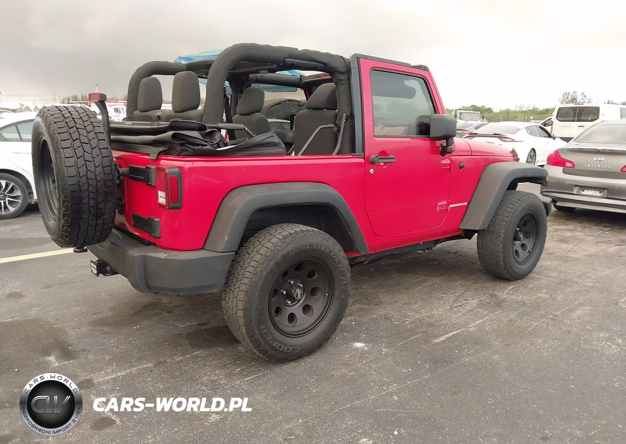 2011 Jeep Wrangler Sport VIN:1J4AA2D12BL523192 - 4