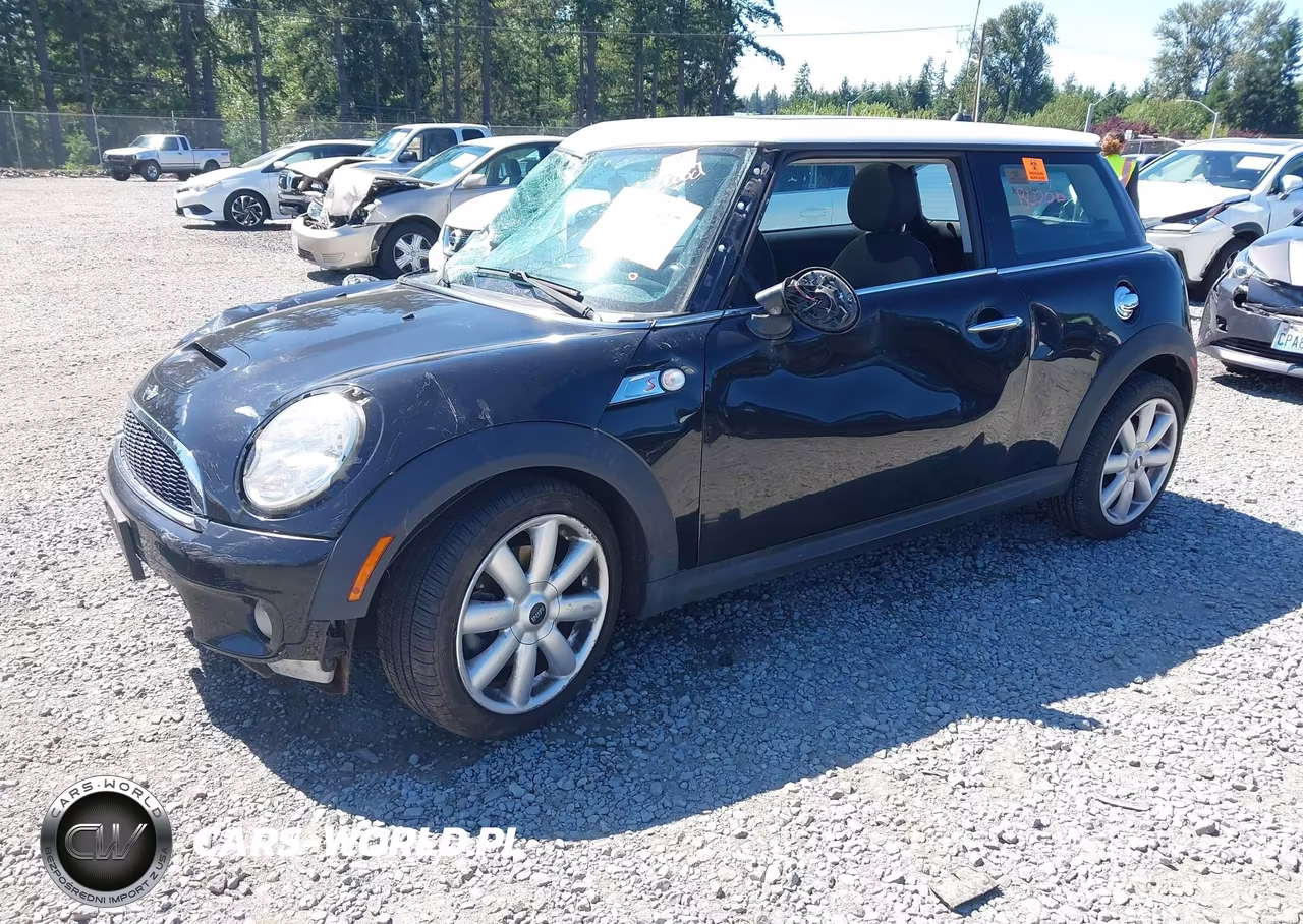 2009 Mini Cooper S VIN:WMWMF73599TW86077 - 2