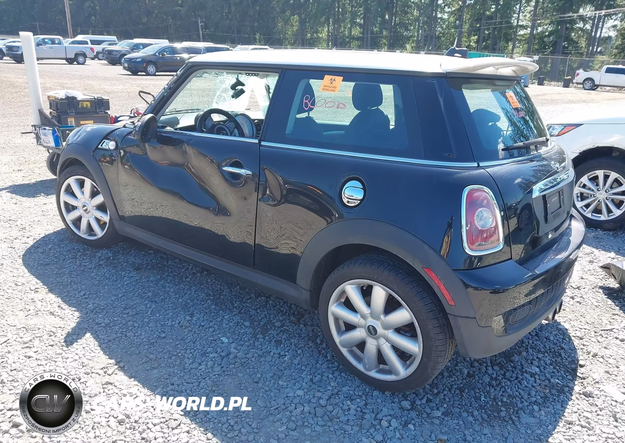 2009 Mini Cooper S VIN:WMWMF73599TW86077 - 3