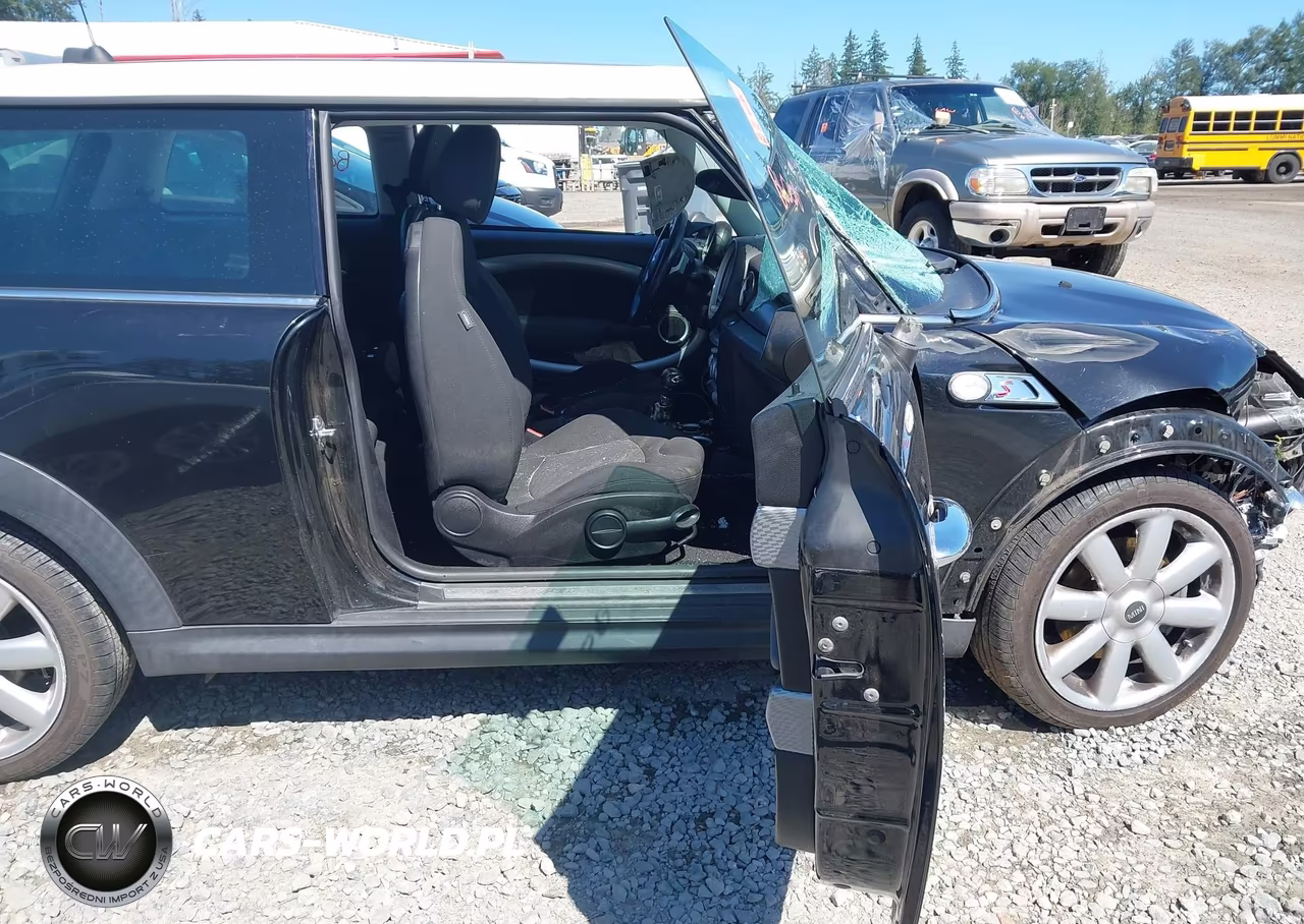 2009 Mini Cooper S VIN:WMWMF73599TW86077 - 5