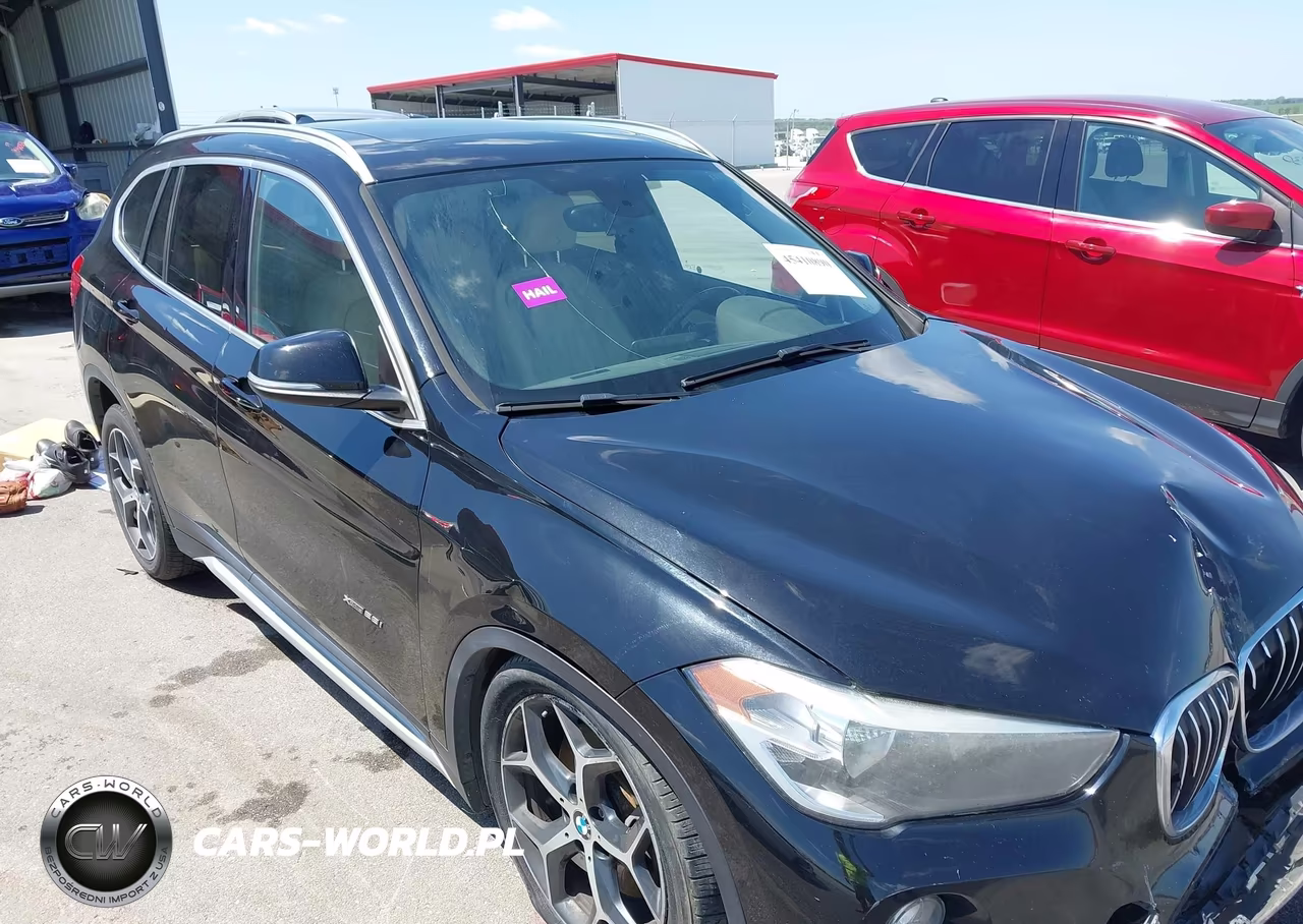 2018 BMW X1 xDrive28I VIN:WBXHT3C35J5K30979 - 18