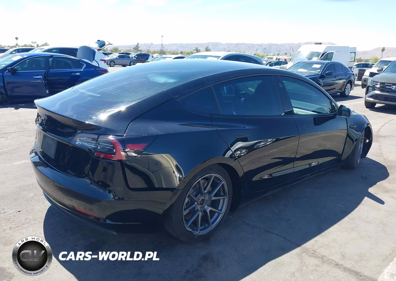 2021 Tesla Model 3 Standard Range Plus Rear-Wheel Drive VIN:5YJ3E1EAXMF062115 - 4