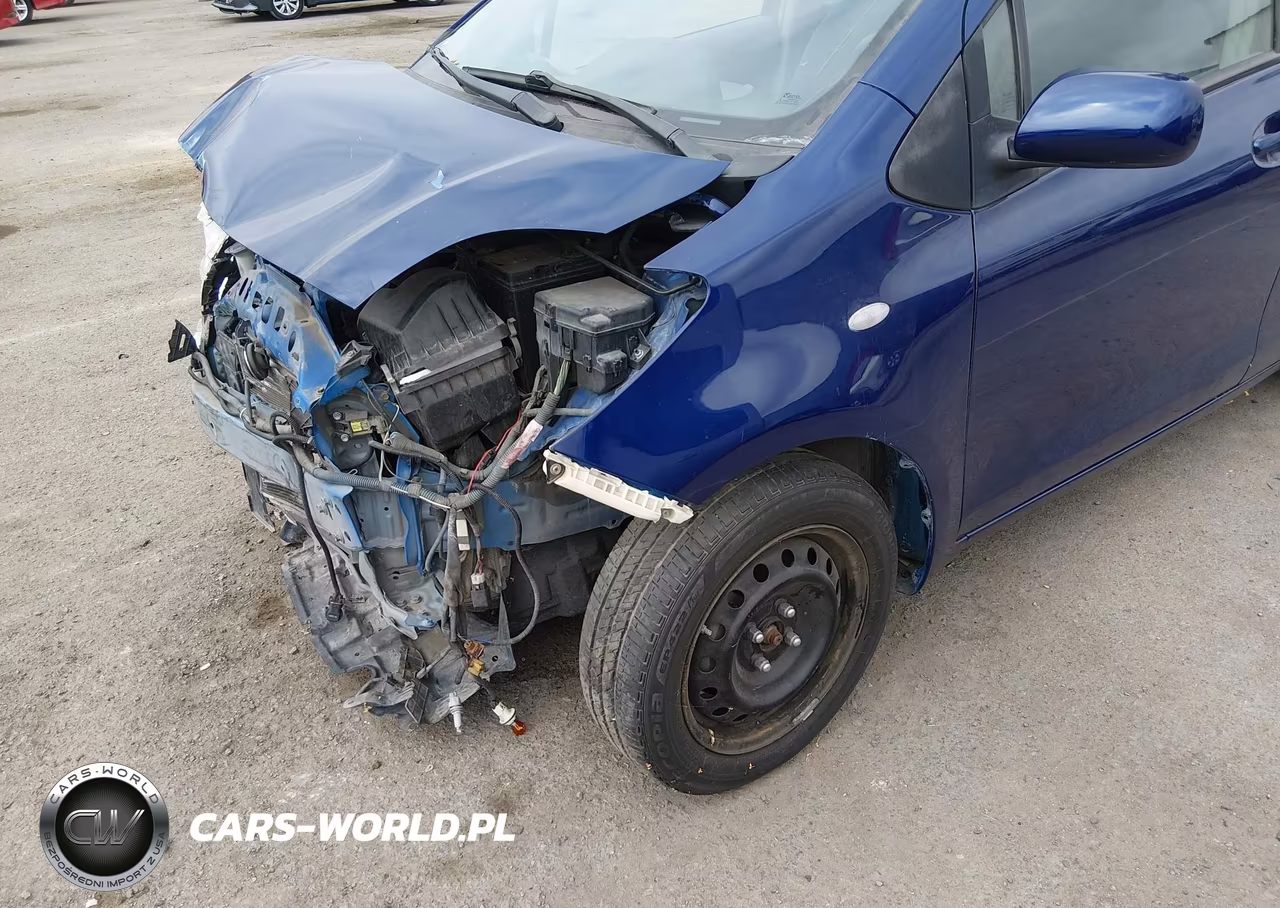 2011 Toyota Yaris VIN:JTDKT4K32B5336205 - 18