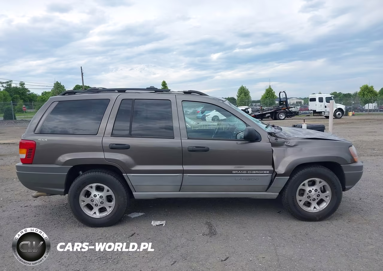 1999 Jeep Grand Cherokee Laredo VIN:1J4GW58N2XC730375 - 12