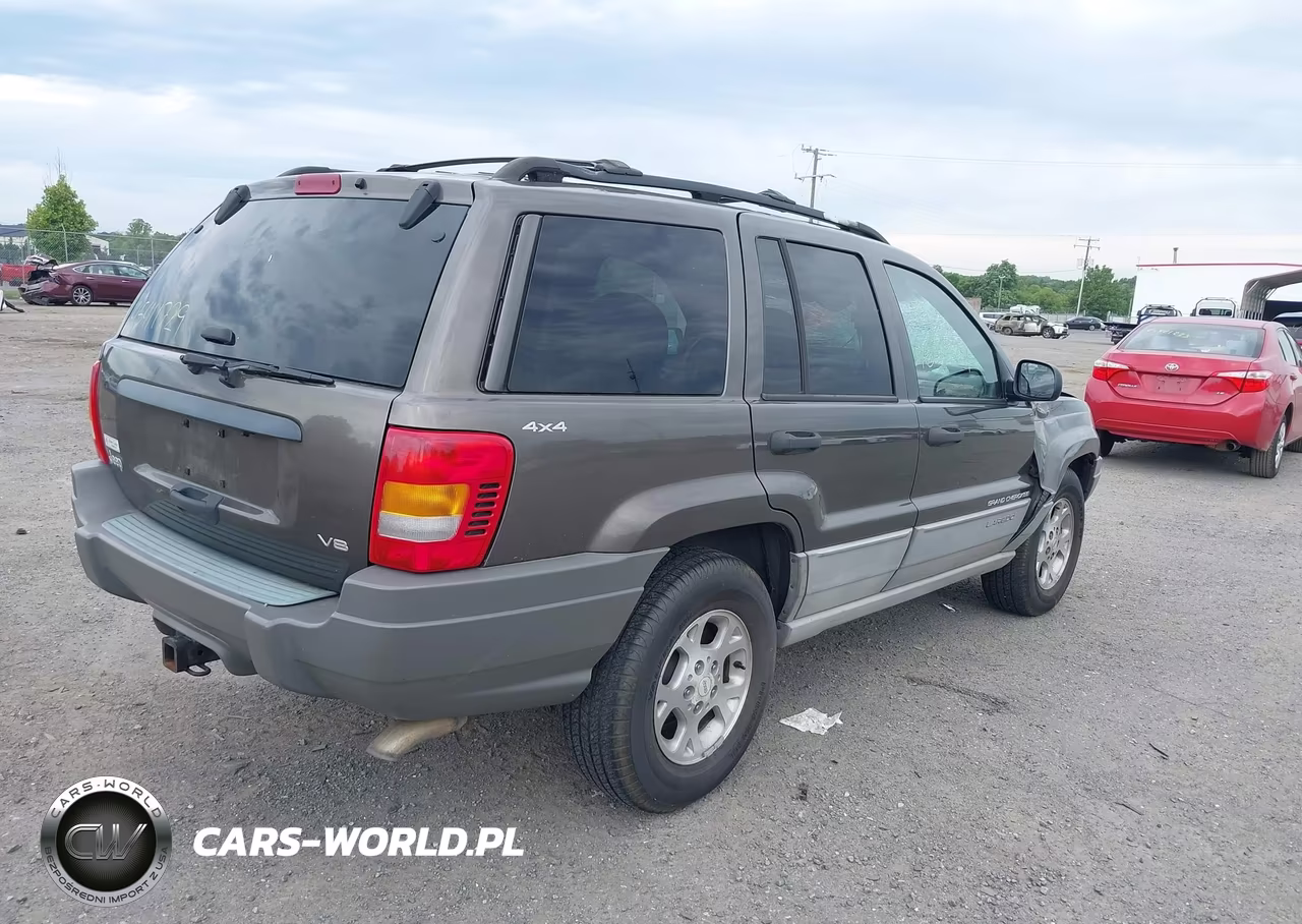 1999 Jeep Grand Cherokee Laredo VIN:1J4GW58N2XC730375 - 4