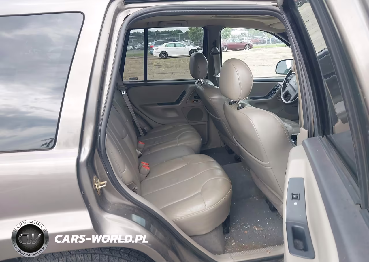 1999 Jeep Grand Cherokee Laredo VIN:1J4GW58N2XC730375 - 8