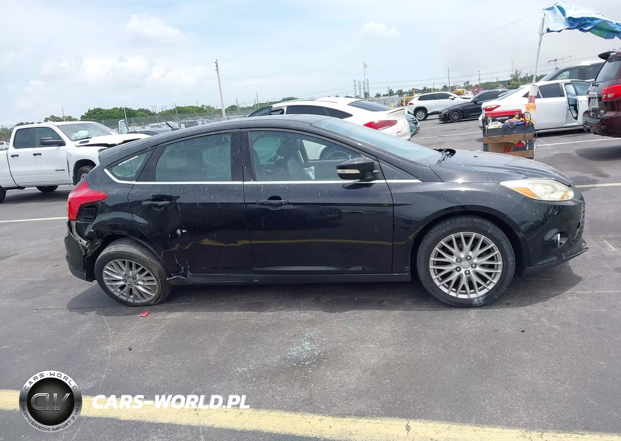 2013 Ford Focus Titanium VIN:1FADP3N25DL168963 - 13