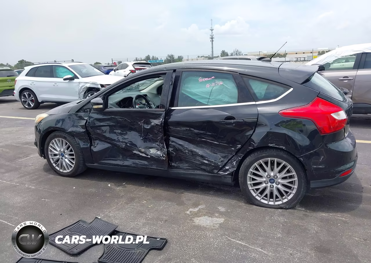 2013 Ford Focus Titanium VIN:1FADP3N25DL168963 - 14