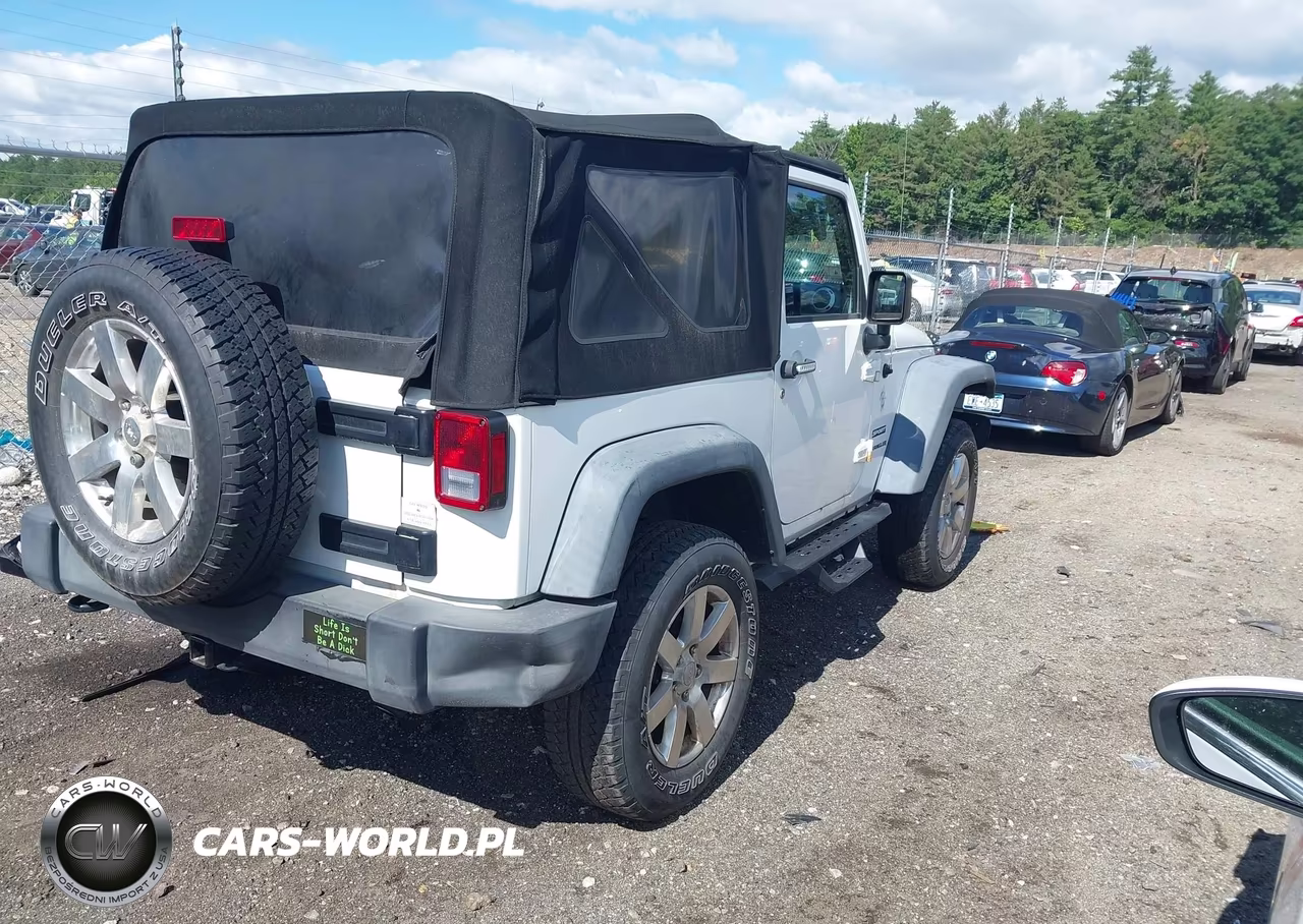 2015 Jeep Wrangler Sport VIN:1C4AJWAG0FL648526 - 4