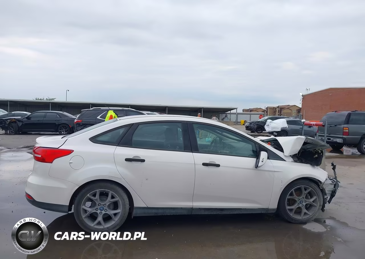2016 Ford Focus S VIN:1FADP3E22GL376612 - 14