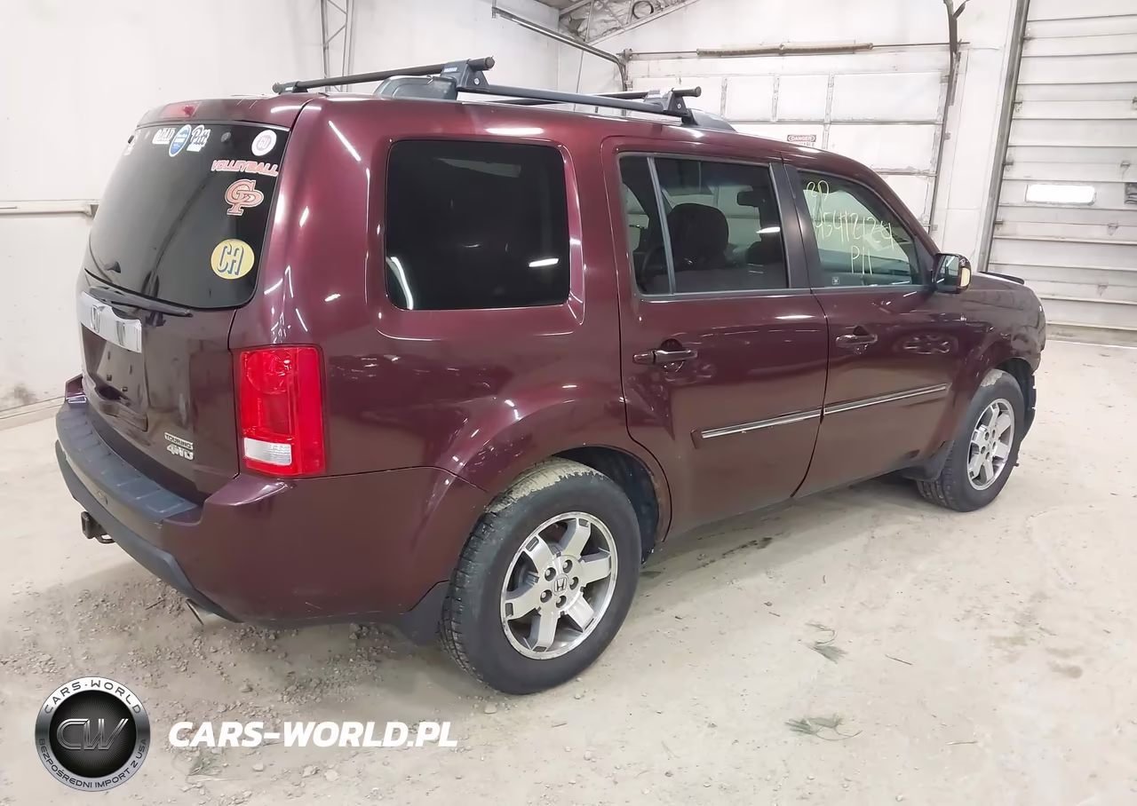 2011 Honda Pilot Touring VIN:5FNYF4H95BB050621 - 4