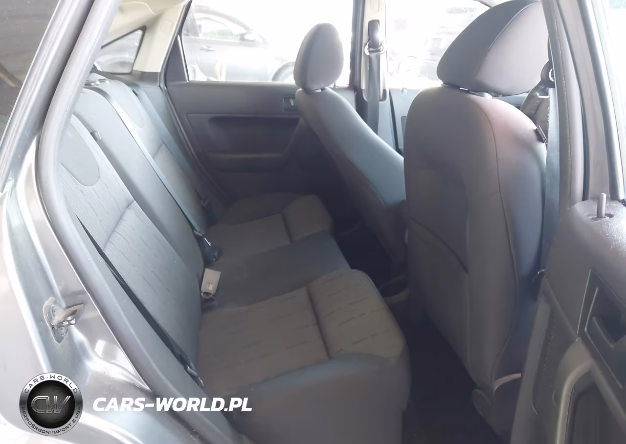 2009 Ford Focus Se VIN:1FAHP35N69W154099 - 8