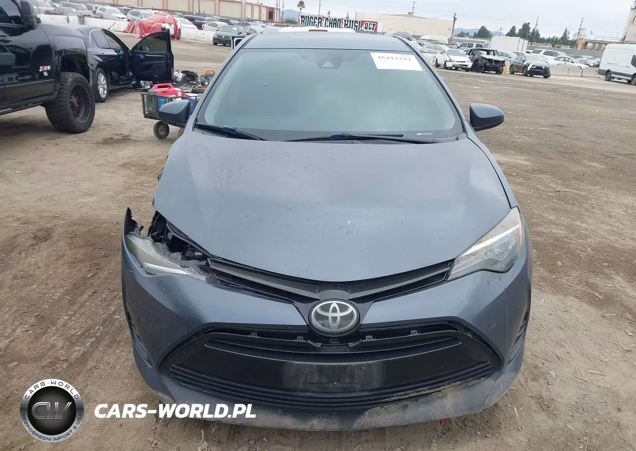 2018 Toyota Corolla Le VIN:5YFBURHE7JP808080 - 12