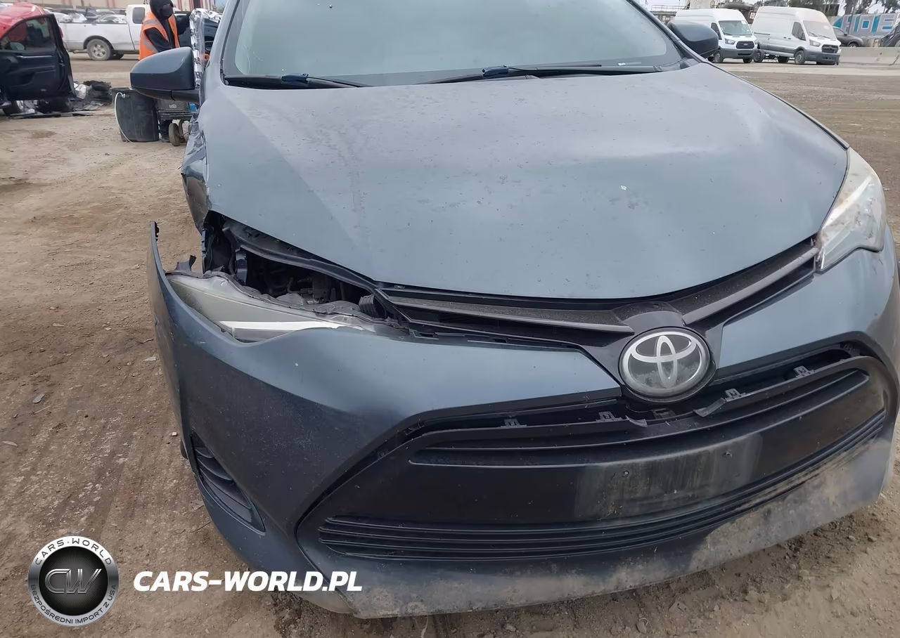 2018 Toyota Corolla Le VIN:5YFBURHE7JP808080 - 18