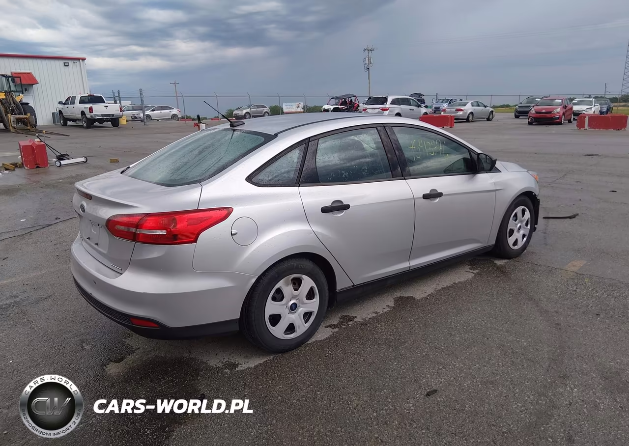 2015 Ford Focus S VIN:1FADP3E23FL248457 - 4