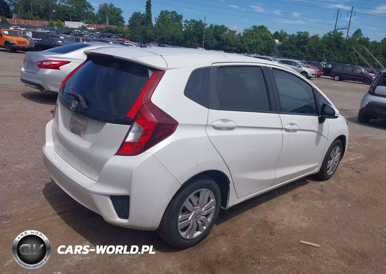 2016 Honda Fit Lx VIN:JHMGK5H58GS002467 - 4