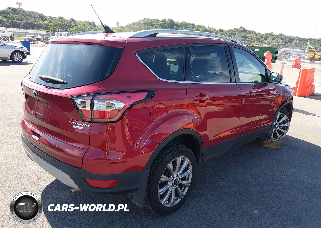 2018 Ford Escape Titanium VIN:1FMCU0J99JUD20843 - 4