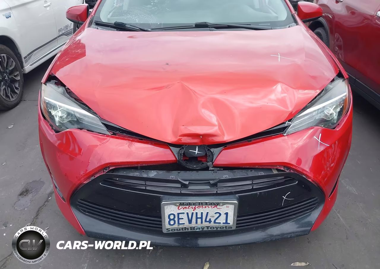 2018 Toyota Corolla Le VIN:5YFBURHE9JP825494 - 12