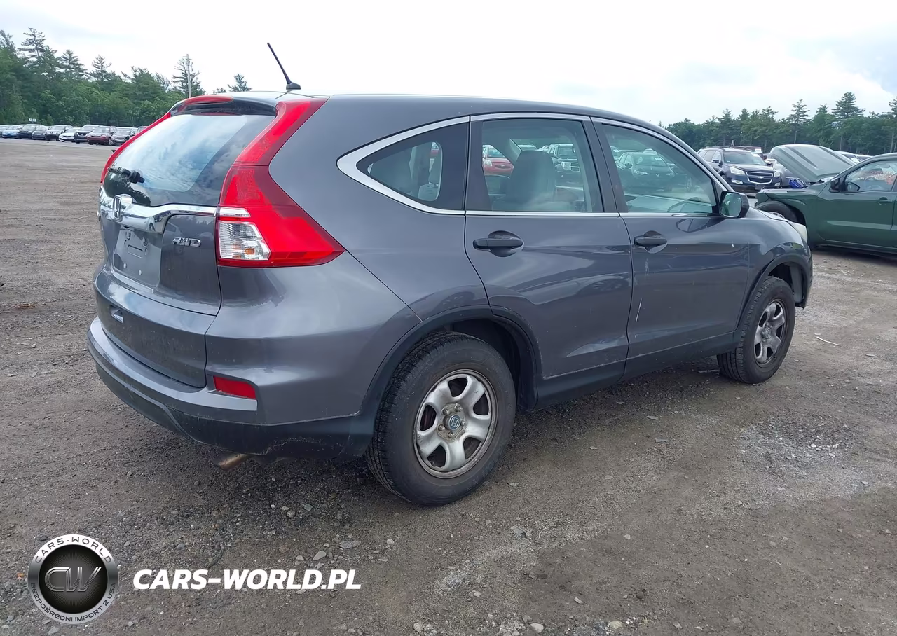 2015 Honda Cr-V Lx VIN:2HKRM4H32FH606347 - 4
