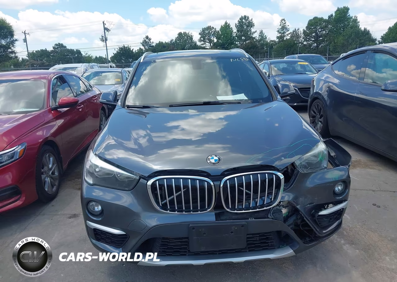 2018 BMW X1 xDrive28I VIN:WBXHT3C31J5L24583 - 12