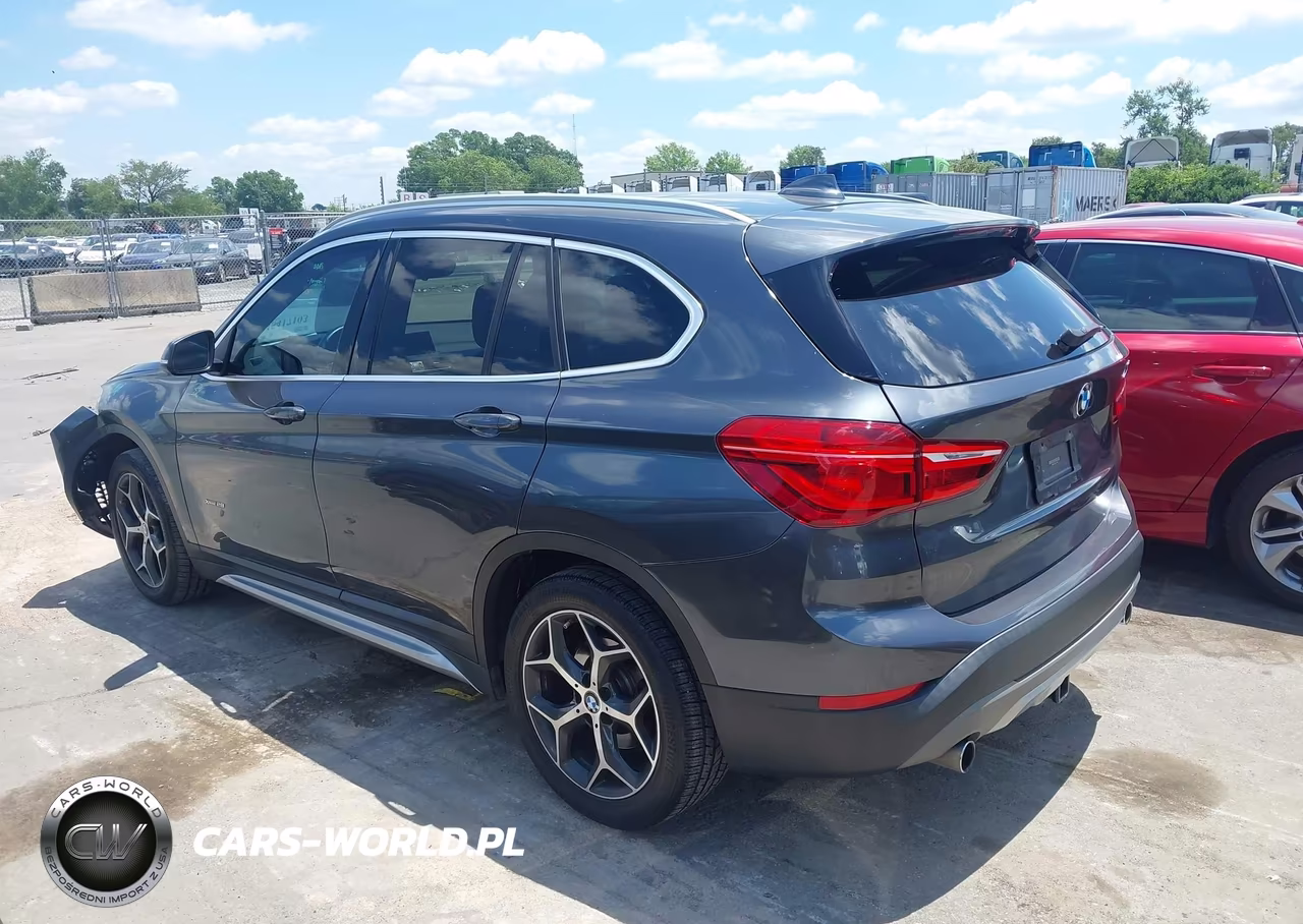 2018 BMW X1 xDrive28I VIN:WBXHT3C31J5L24583 - 14