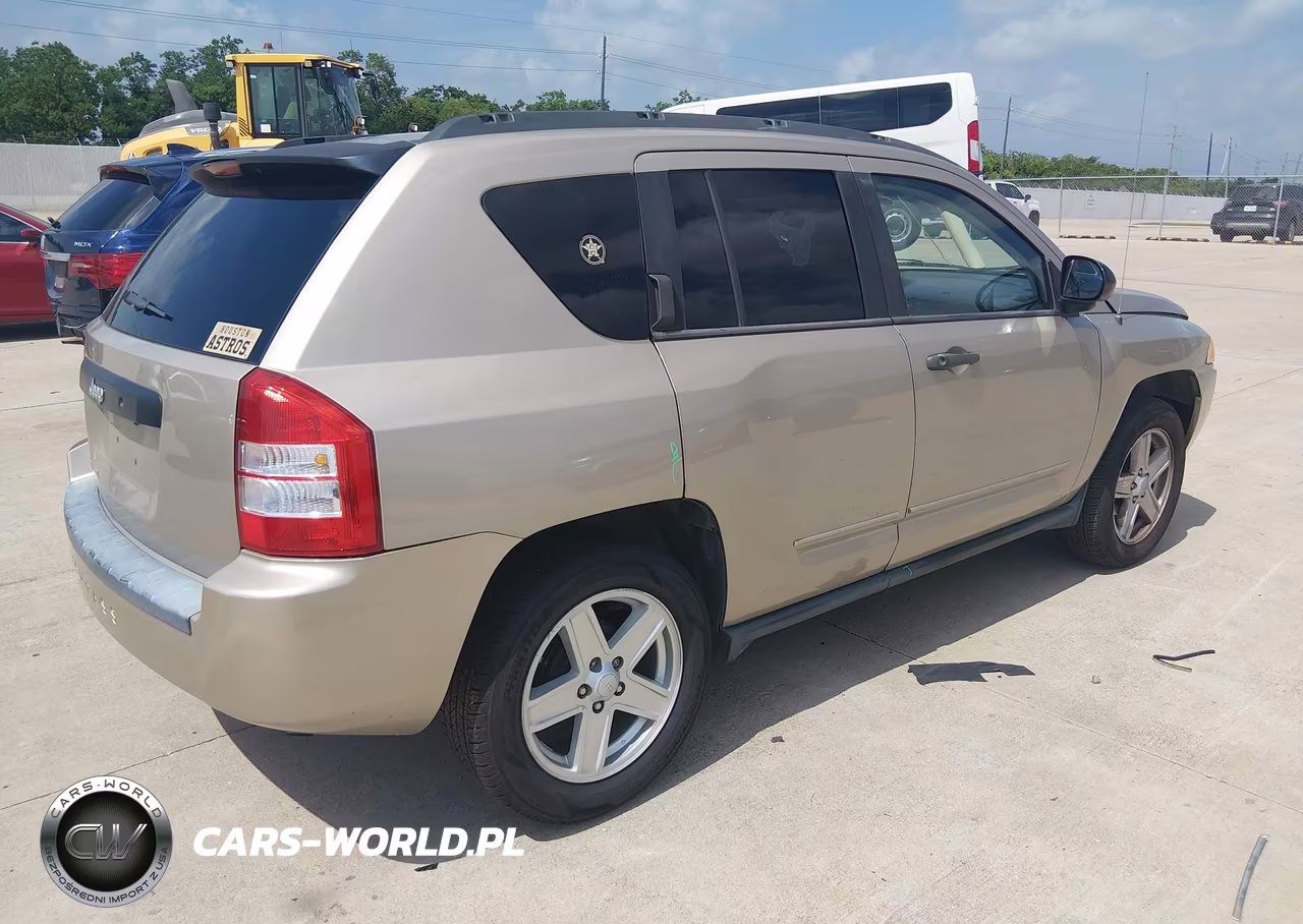 2010 Jeep Compass Sport VIN:1J4NT1FA9AD629716 - 4