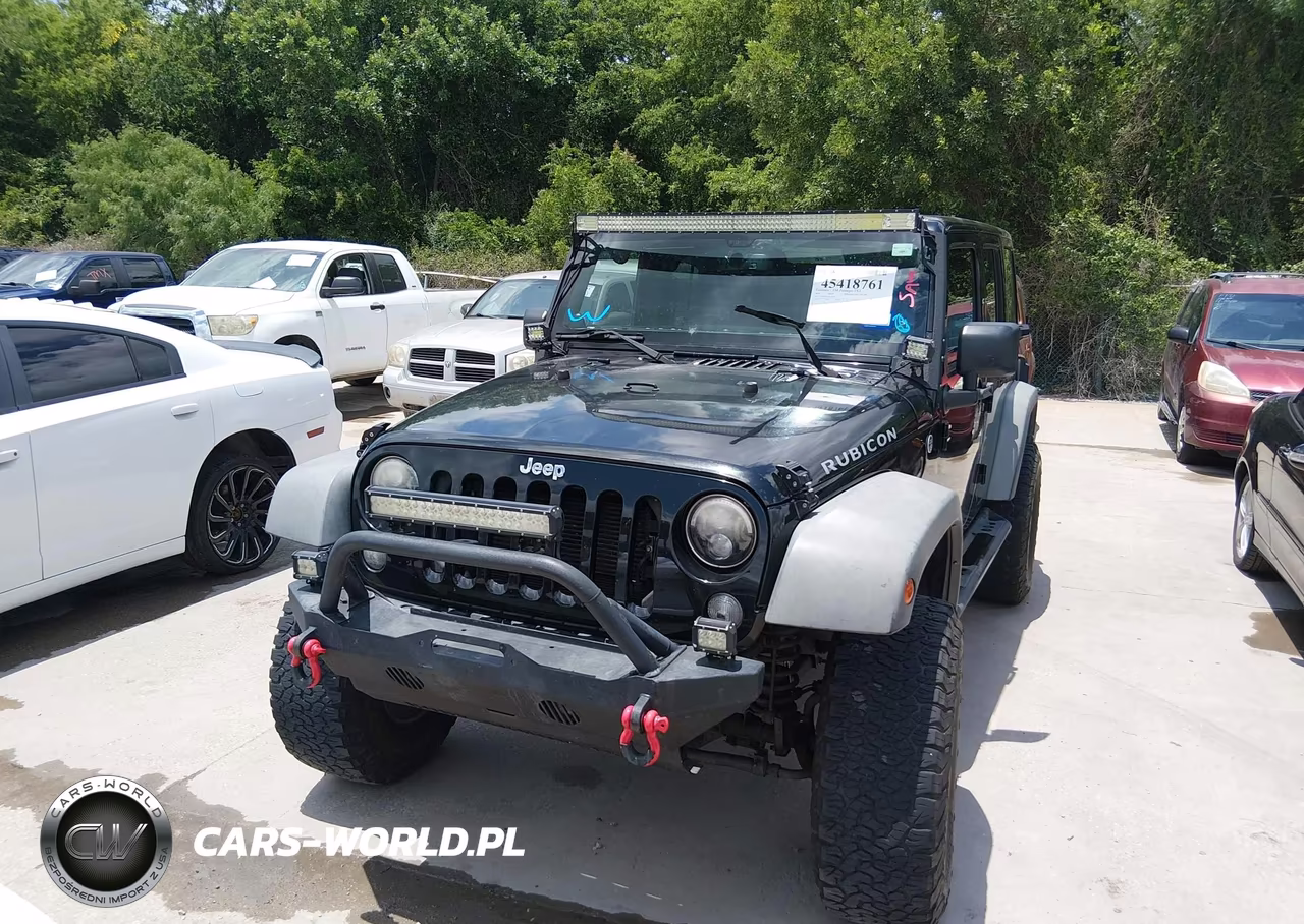 2014 Jeep Wrangler Unlimited Rubicon VIN:1C4BJWFG3EL158111 - 12