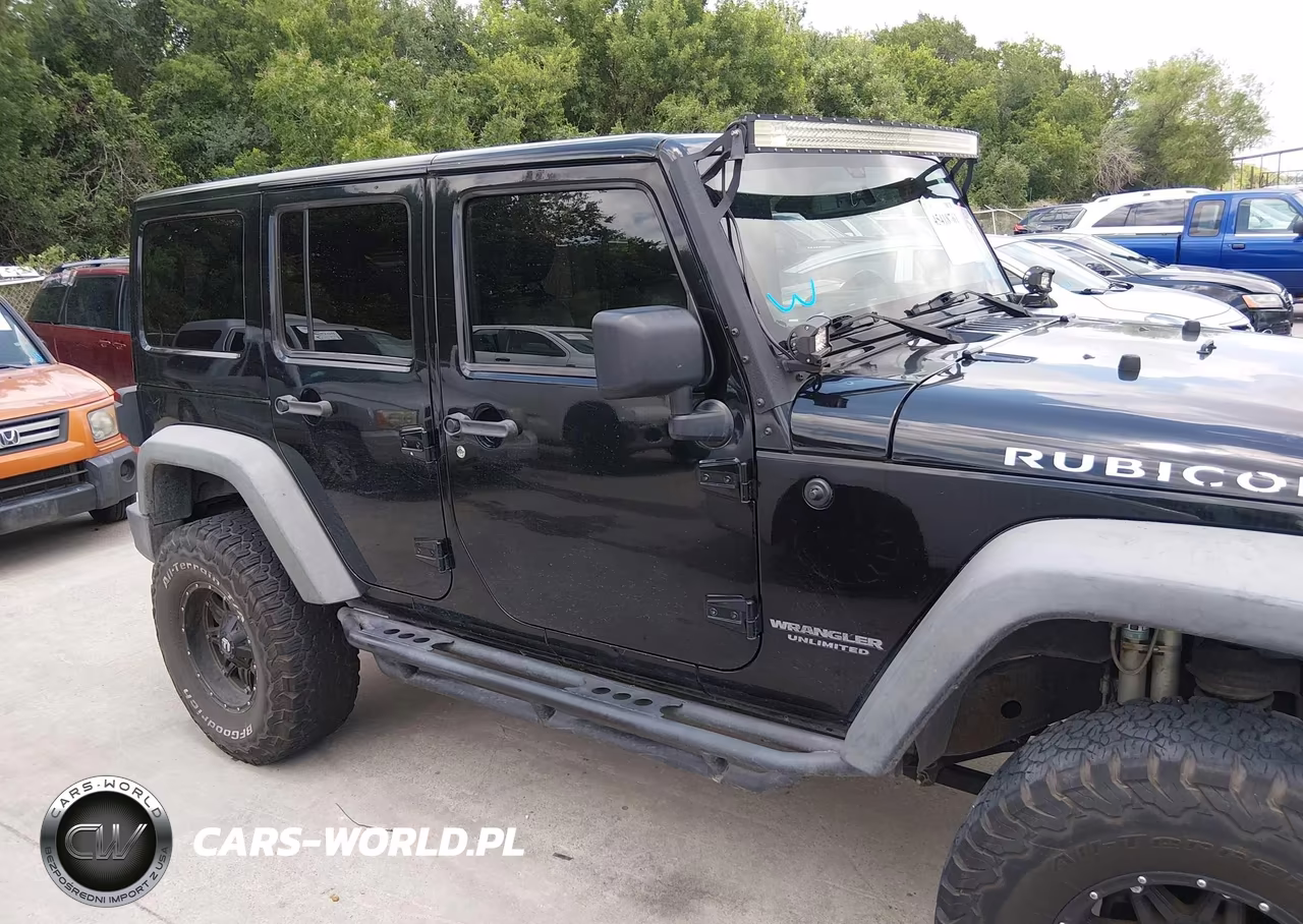 2014 Jeep Wrangler Unlimited Rubicon VIN:1C4BJWFG3EL158111 - 13