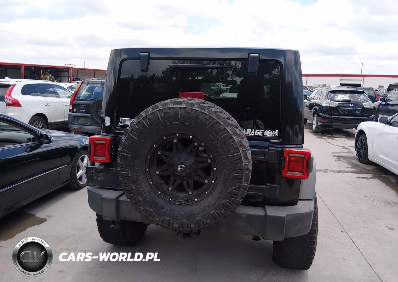 2014 Jeep Wrangler Unlimited Rubicon VIN:1C4BJWFG3EL158111 - 16