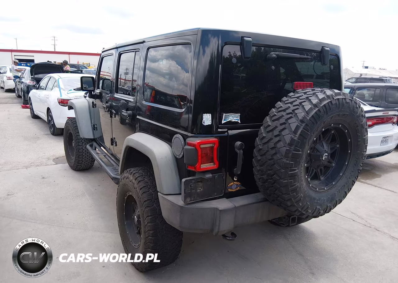 2014 Jeep Wrangler Unlimited Rubicon VIN:1C4BJWFG3EL158111 - 3