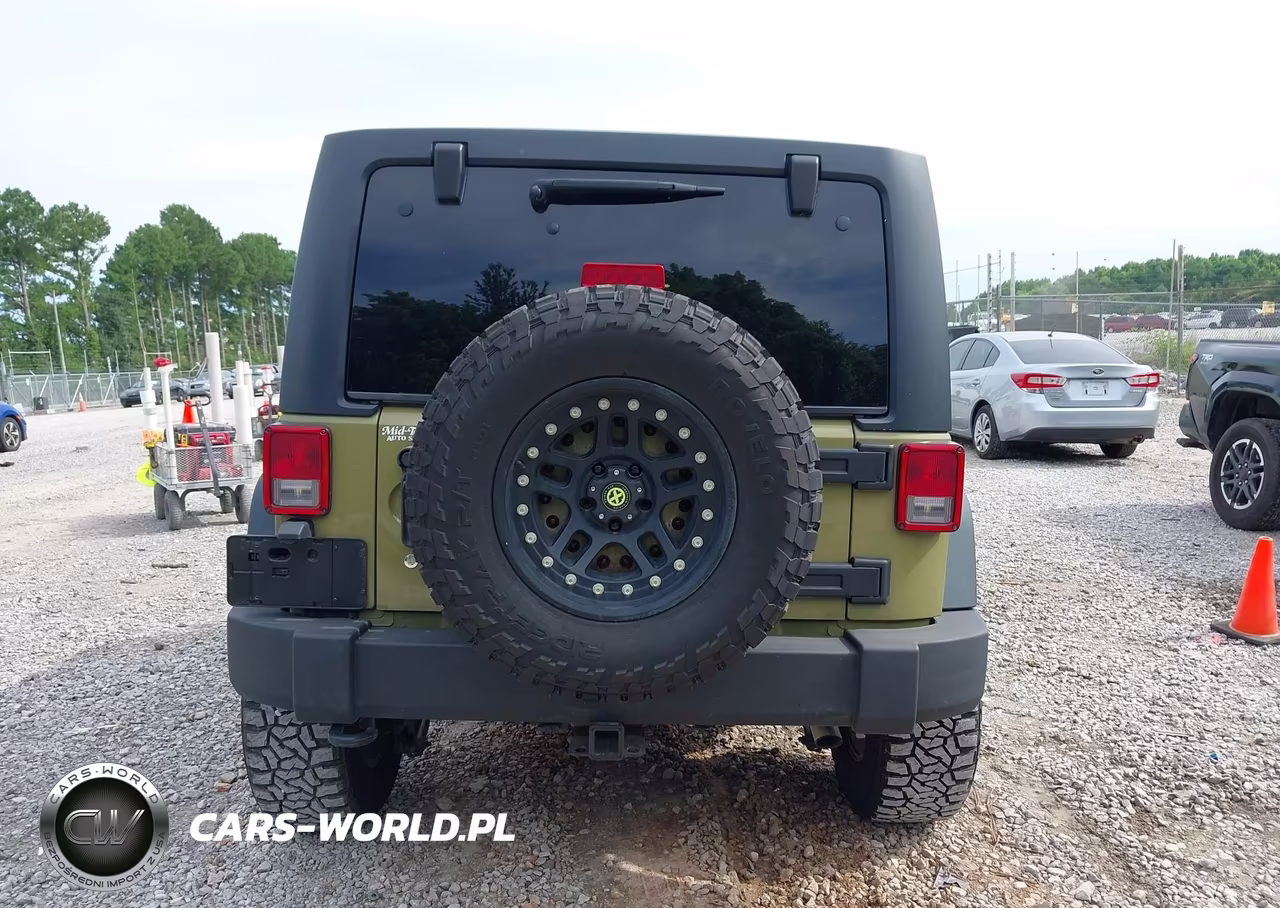 2013 Jeep Wrangler Unlimited Rubicon VIN:1C4BJWFGXDL571867 - 16