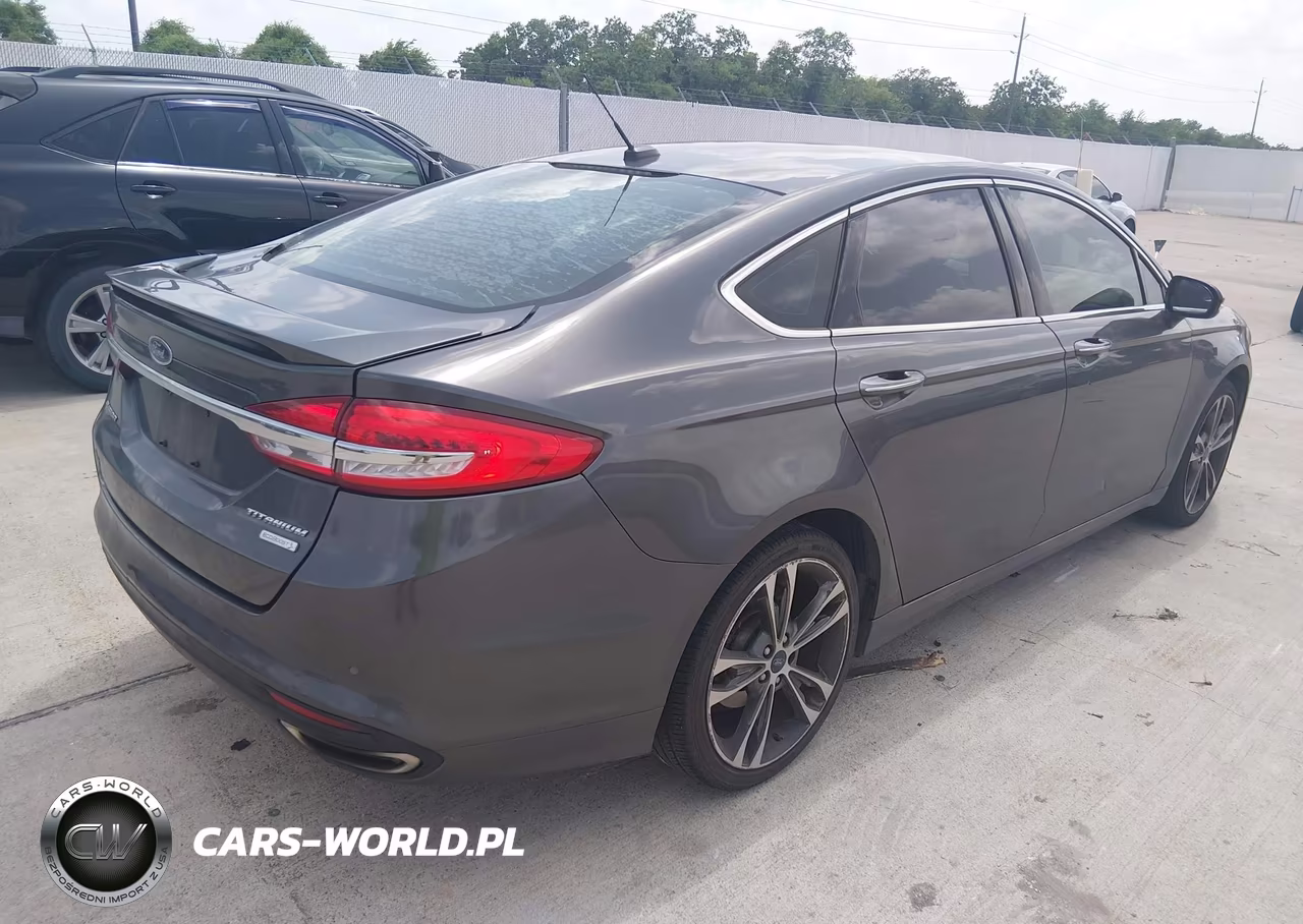 2017 Ford Fusion Titanium VIN:3FA6P0K96HR214834 - 4