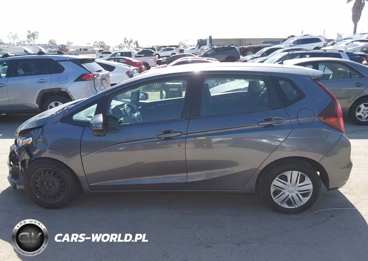 2019 Honda Fit Lx VIN:3HGGK5H47KM720023 - 14
