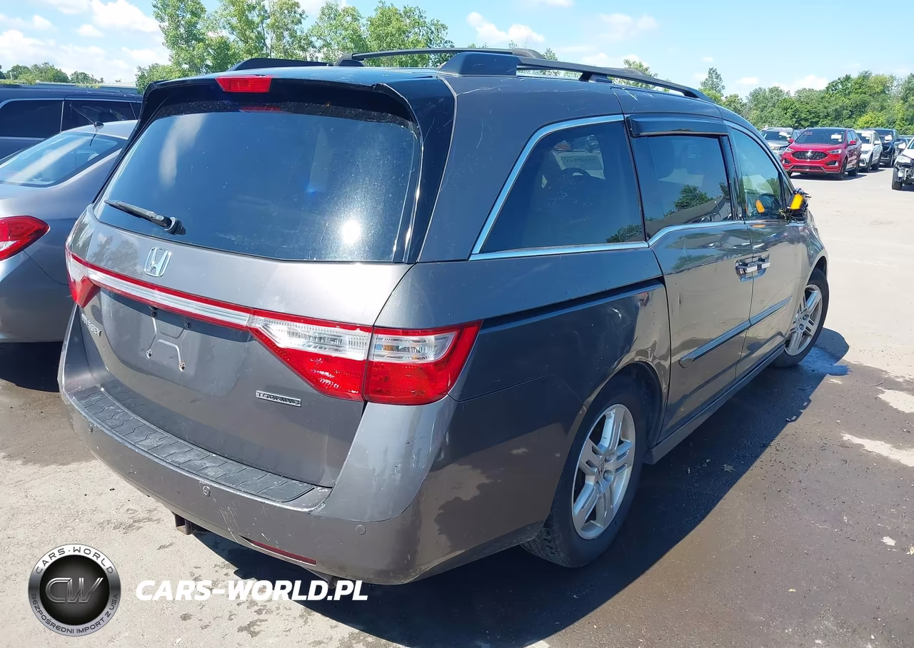 2012 Honda Odyssey Touring-Touring Elite VIN:5FNRL5H92CB034607 - 4