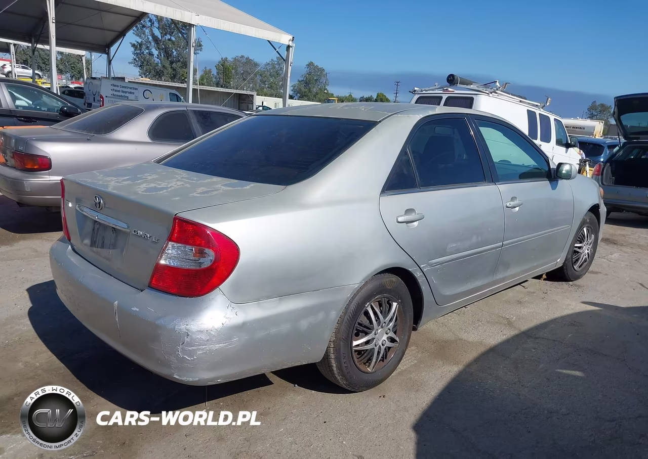 2003 Toyota Camry Le VIN:JTDBE32K330226502 - 4