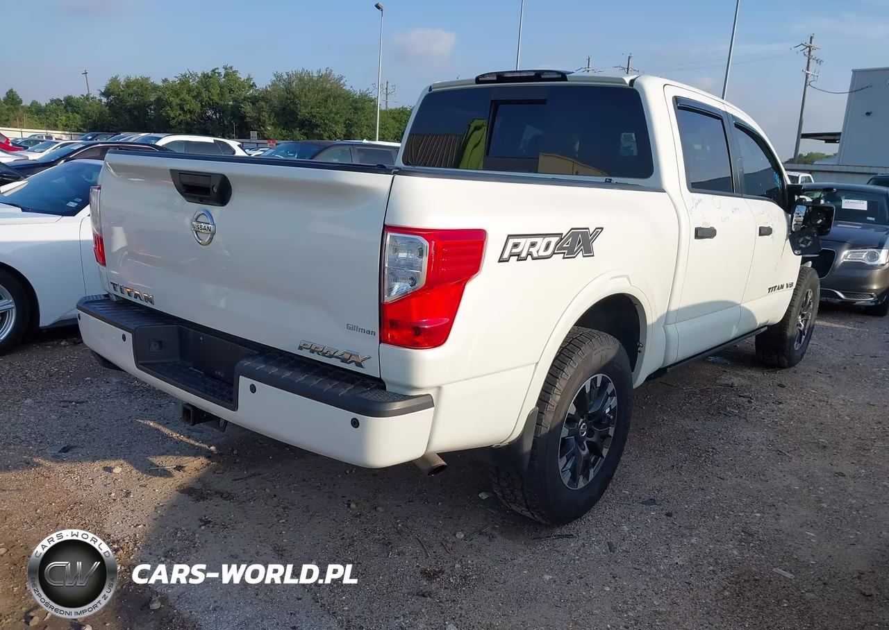 2018 Nissan Titan Pro-4X VIN:1N6AA1E5XJN531624 - 4