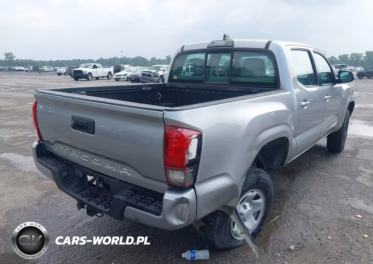 2018 Toyota Tacoma Sr VIN:5TFAX5GN4JX119869 - 4