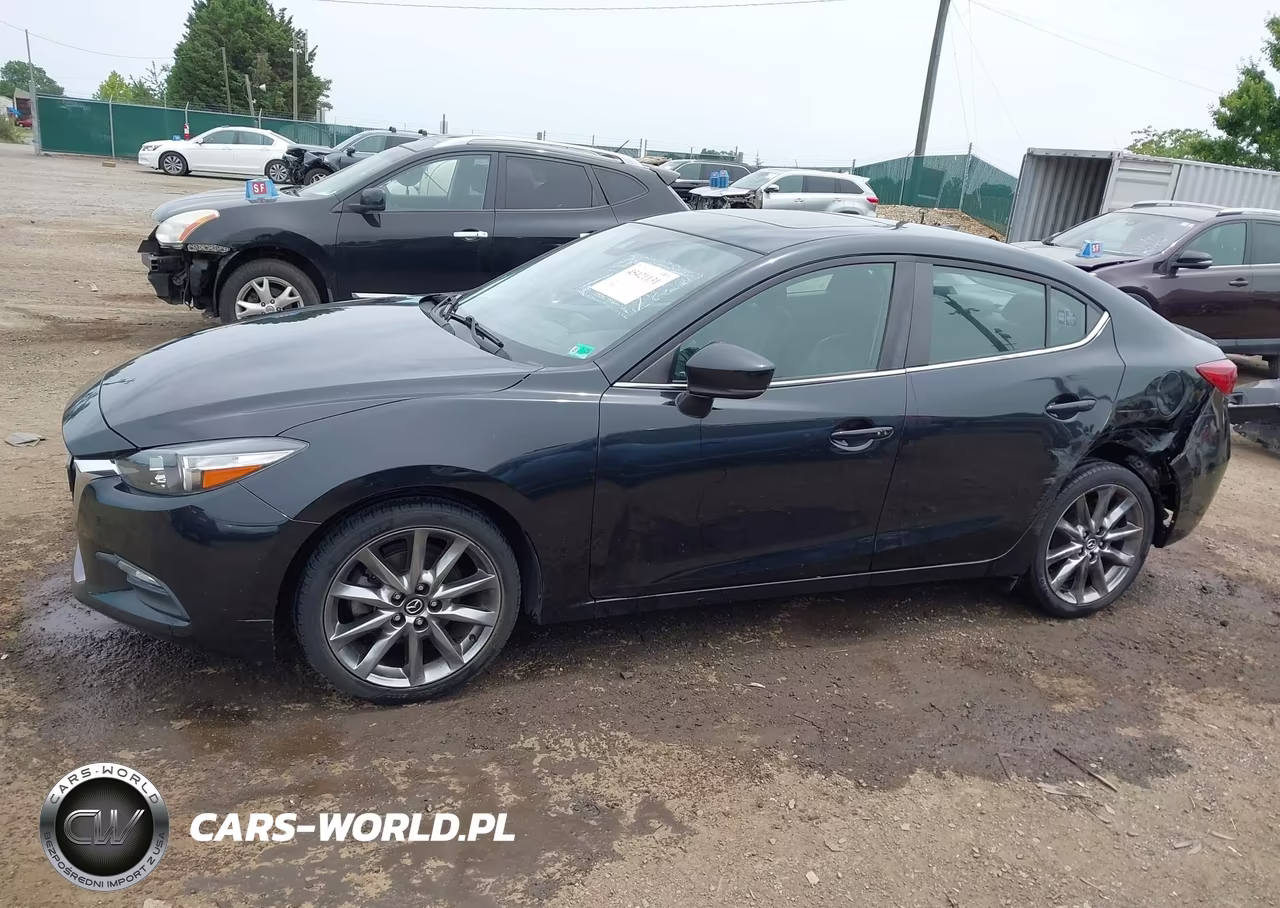 2018 Mazda Mazda3 Touring VIN:3MZBN1V34JM215945 - 14