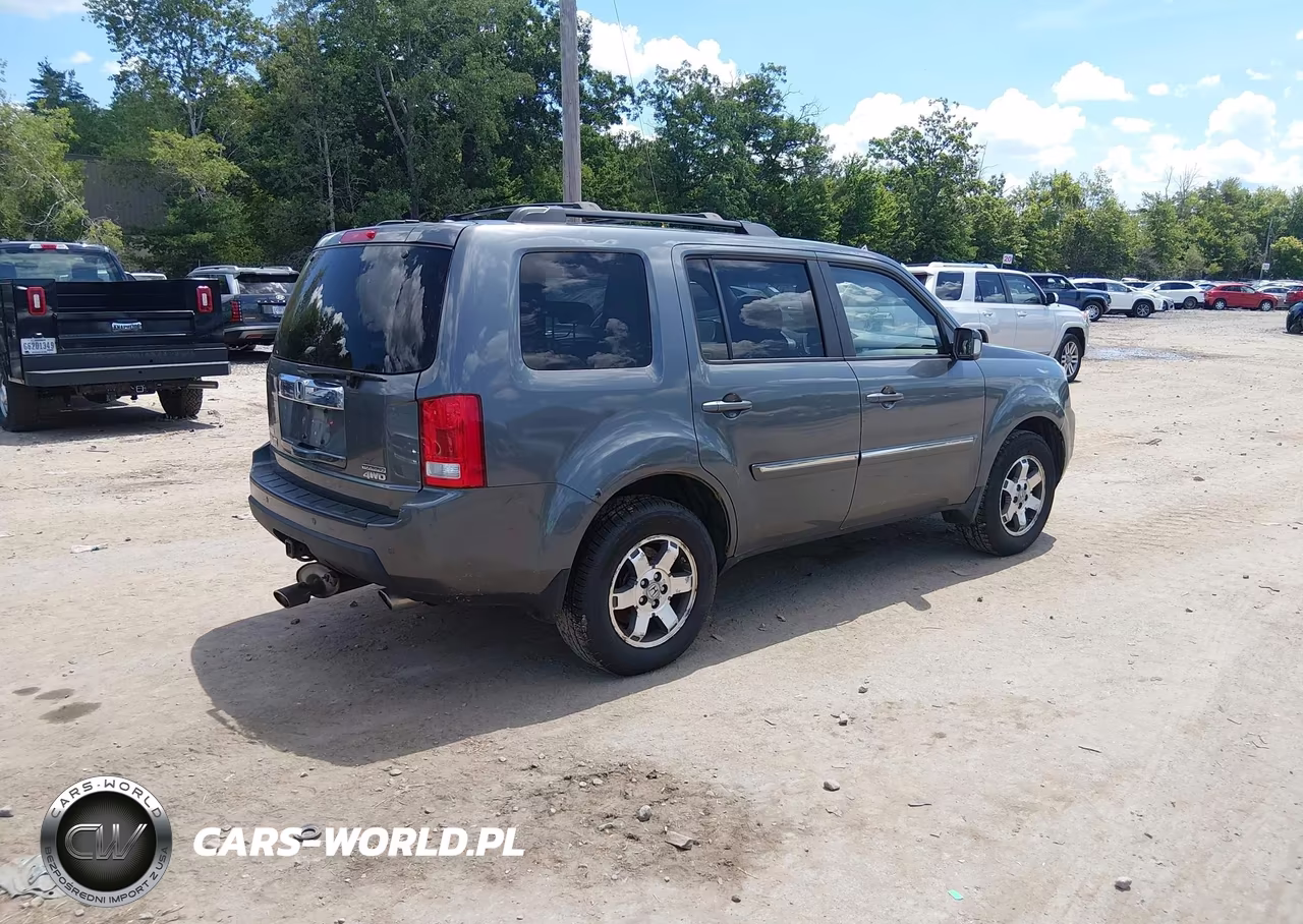2011 Honda Pilot Touring VIN:5FNYF4H95BB042244 - 4