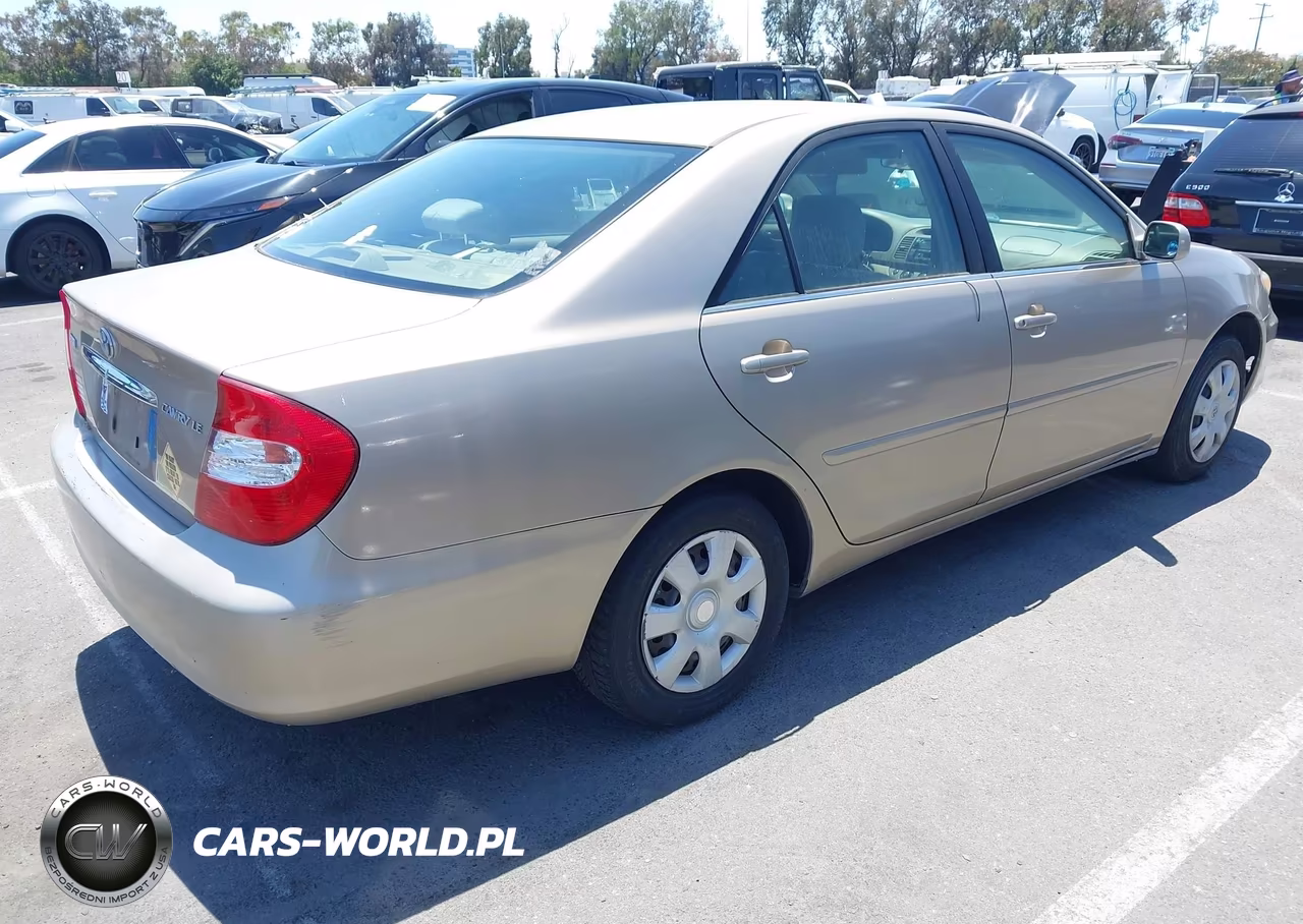 2003 Toyota Camry Le VIN:JTDBE32K330175745 - 4
