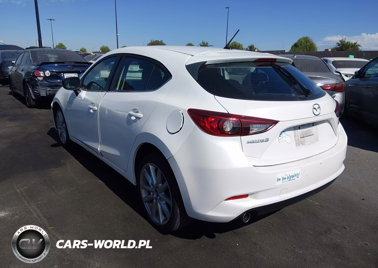 2017 Mazda Mazda3 Touring VIN:3MZBN1L77HM103804 - 14