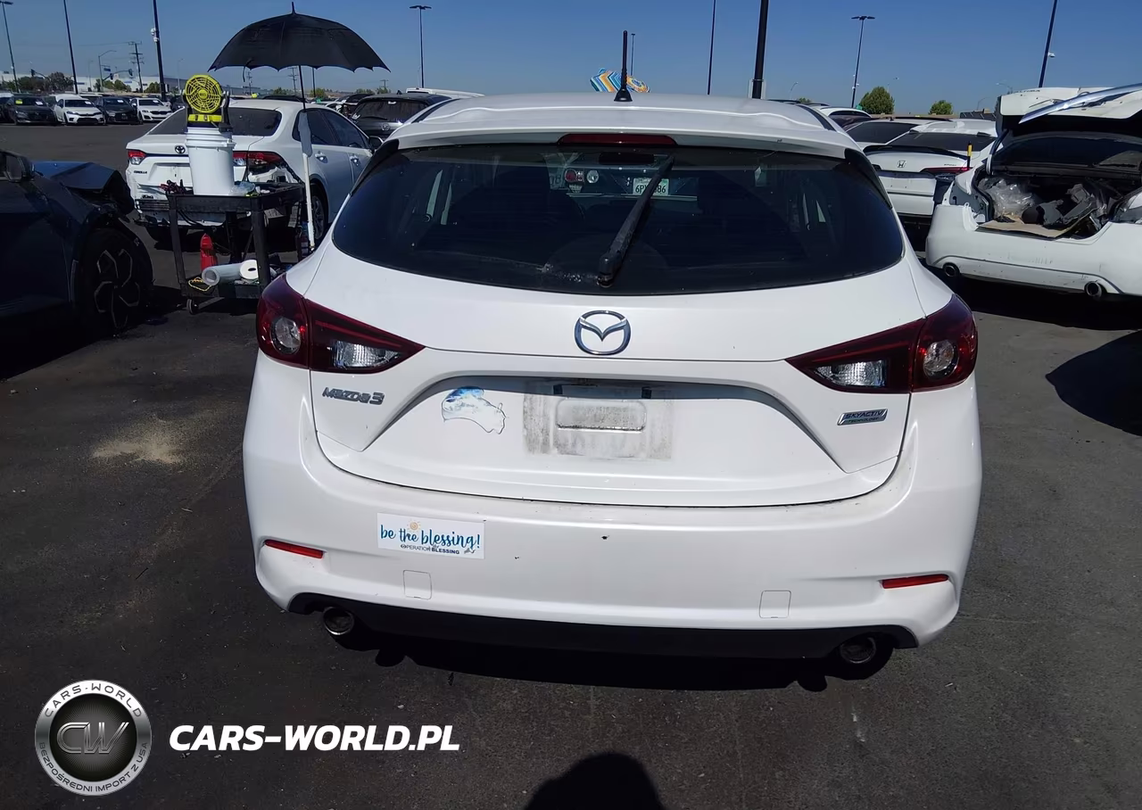 2017 Mazda Mazda3 Touring VIN:3MZBN1L77HM103804 - 16
