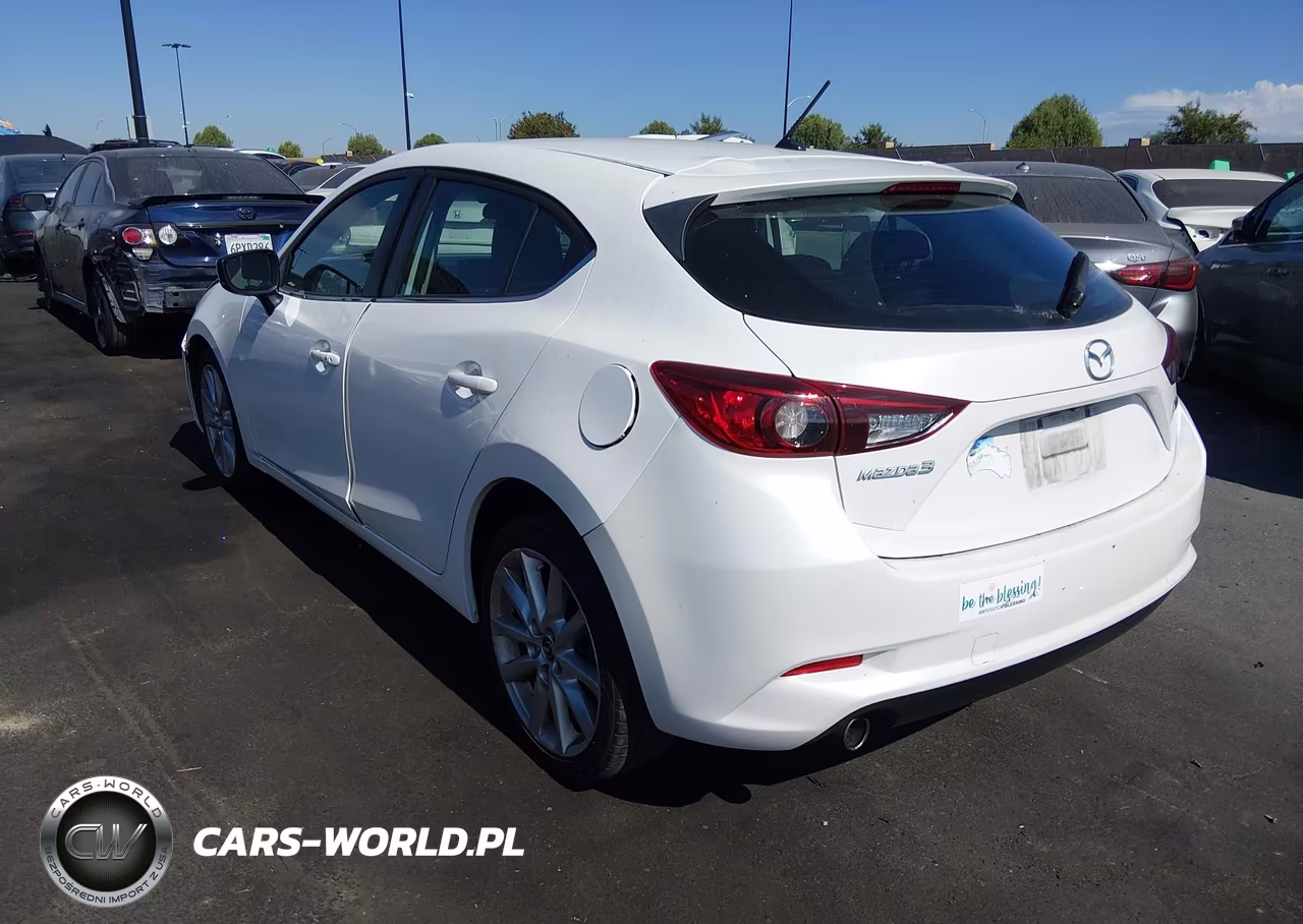 2017 Mazda Mazda3 Touring VIN:3MZBN1L77HM103804 - 3