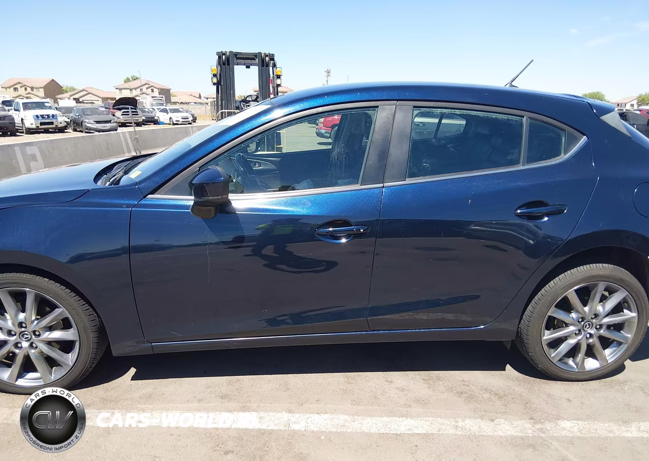 2018 Mazda Mazda3 Touring VIN:3MZBN1L31JM204615 - 14