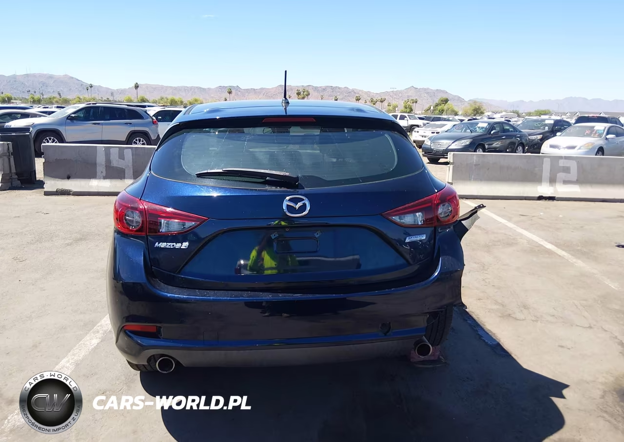 2018 Mazda Mazda3 Touring VIN:3MZBN1L31JM204615 - 16
